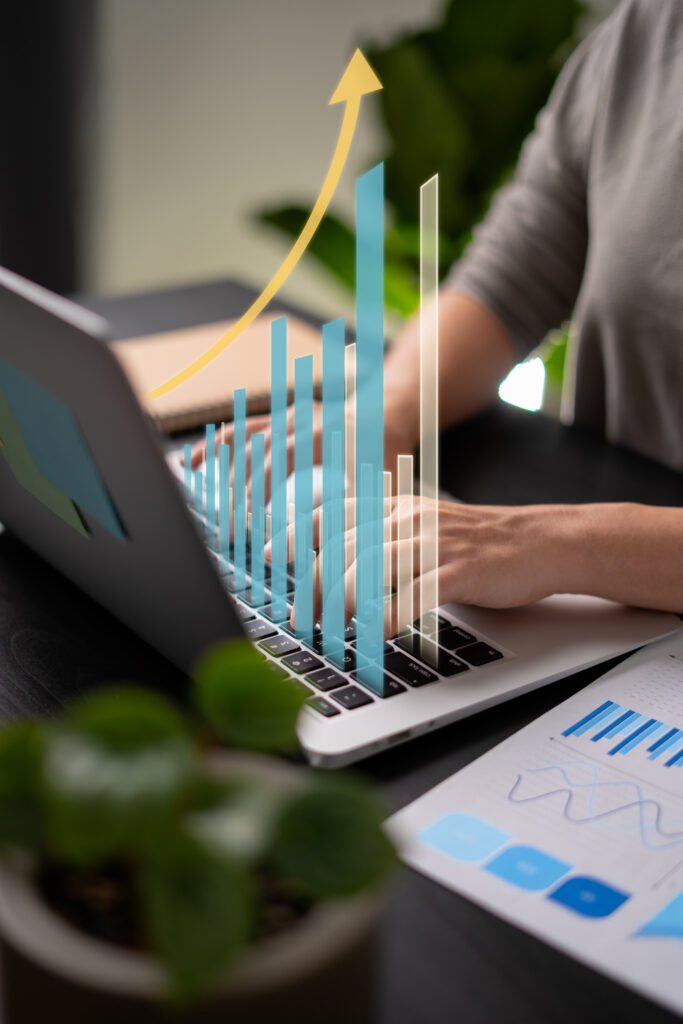Close up shot of females hands typing on laptop for plan busines